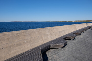 Sea Promenade Concrete Wall With Long Bench