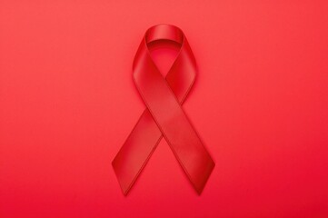 Global awareness day highlights the satin ribbon symbol to promote health initiatives focused on HIV and sexually transmitted diseases.