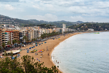 View on the beach of Lloret de Mar,  Mediterranean coastal town in Catalonia, Spain. August, 2025.