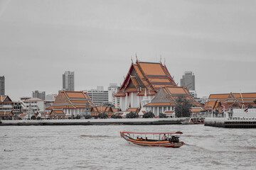 Bangkok, Thailand - December 9, 2024 : Chao Phraya river view of Bangkok, Thailand's Wat Arun. The...
