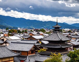 Obraz premium Panoramic view of traditional Japanese rooftops and pagoda