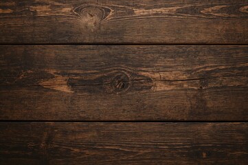 Obraz premium High-resolution texture of dark brown wooden planks