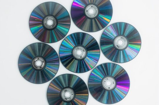 Digital storage discs isolated on white, technology concept with plastic multimedia media
