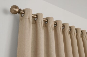 Drapery hanging from a metallic rod