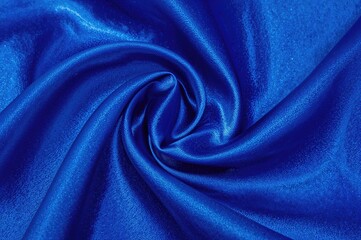 Detailed view of blue satin material