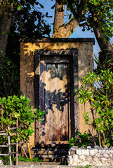 old wooden door in a stone wall