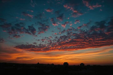 Vibrant evening sky over an urban landscape