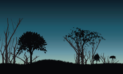 Scenic forest silhouette with trees and grass against twilight gradient sky