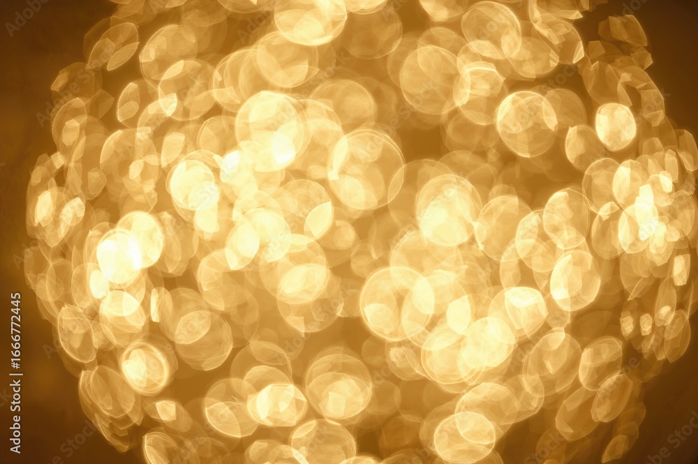 Poster Defocused golden bokeh patterns creating an abstract festive texture