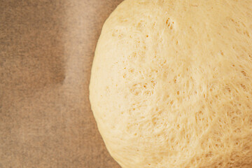 Dough raw cooking yeast, flour, water tasty snack fresh delicious gourmet food background on the table rustic food top view copy space