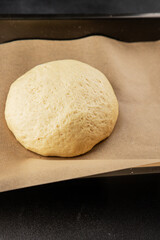 Dough raw cooking yeast, flour, water tasty snack fresh delicious gourmet food background on the table rustic food top view copy space