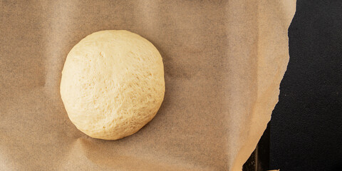 Dough raw cooking yeast, flour, water tasty snack fresh delicious gourmet food background on the...