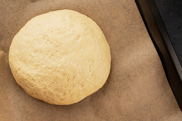 Dough raw cooking yeast, flour, water tasty snack fresh delicious gourmet food background on the table rustic food top view copy space