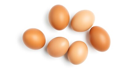 Fresh brown eggs with natural texture, isolated on a pure white background under soft overhead lighting.