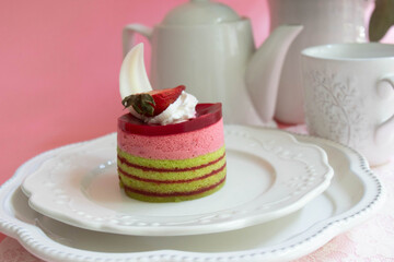 Dessert Concept , Strawberry cake on Pink Background