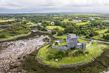 Dunguaire Castle reflected in waters near Kinvara Galway