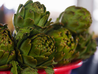 Fototapeta premium fresh artichokes at organic market