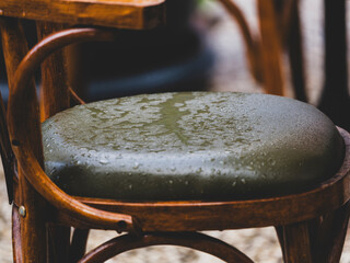 bar stool wet from rain