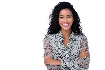 Happy young woman smiling confidently, arms crossed in polka dot blouse, isolated on white transparent background