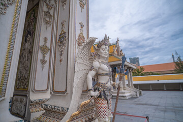 Wat Pariwat Temple, is new famous Buddhism temple in Bangkok locate on Rama 3 Road, Bangkok Thailand. It features unique beautifully crafted Thai mosaic depictions of popular cultural icon
