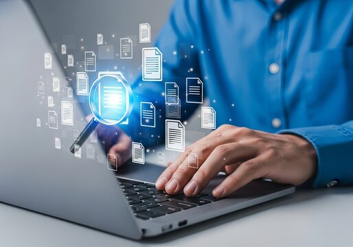 Closeup of hands typing on a laptop with digital documents and a magnifying glass, symbolizing data exploration and digital information processing