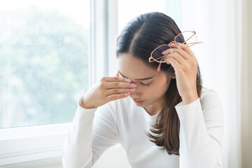 Eye problem concept, fatigue asian young woman tired eyes, irritated rubbing eye dry relief vision...