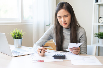 Business financial concept, stressed asian young business woman hand holding credit card for...