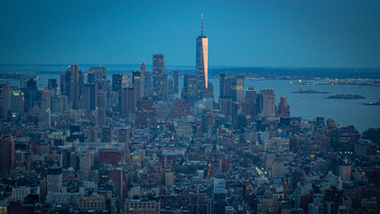 Aerial view of New York City skyline at dusk with One World Trade Center