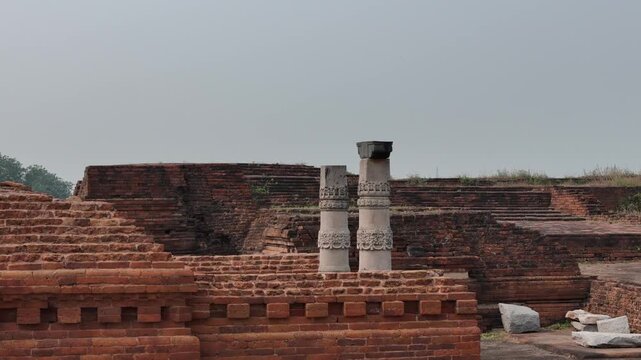Aerial drone shot of the ancient ruins of Nalanda University in Bihar, India, UNESCO World Heritage Site and historic center of learning