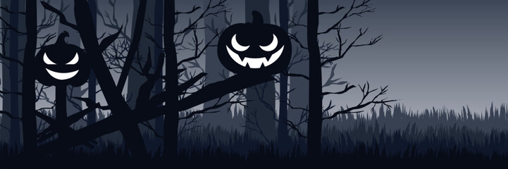 Panoramic Halloween scene with creepy carved pumpkins in a mysterious grey woodland. a wide-screen template with empty space for creative agency ads.