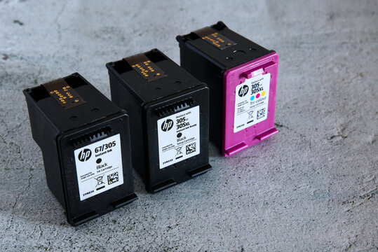 Empty HP printer cartridges on a light background