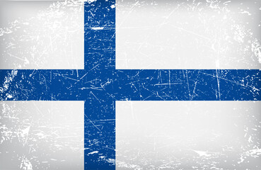 Vintage grunge textured Finland national flag with distressed surface effect and rough worn blue Nordic cross on white background.