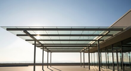 Modern glass-roofed outdoor patio structure.