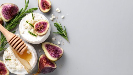 Creamy cheese, figs, and honey on a gray background.  