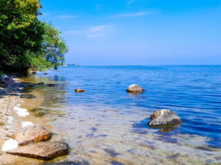 Seascape of Baltic Sea crystal water, rocks and sea bottom.