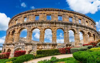 Pula, Croatia, 18 April 2025 - Exterior of the Pula Arena, the old roman theater in the old town of Pula