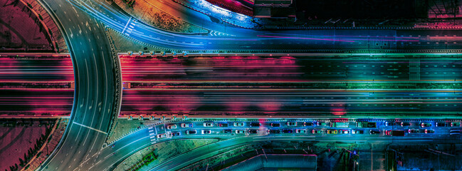 Expressway, Self-driving autonomous electric cars of the future with elements move along a busy traffic intersection. Artificial Intelligence, Car Scan, GPS Tracking, Smart Roads, IoT, highway