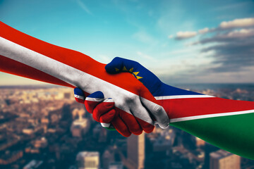Shaking hands Austria and Namibia