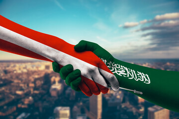 Shaking hands Austria and Saudi Arabia