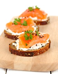Smoked salmon appetizers on toasted bread