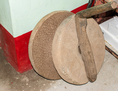 Indian Vintage hand chakki or Stone Jata for grinding grains like wheat, rice.