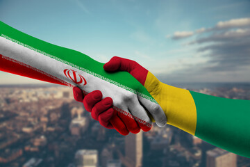 Shaking hands Iran and Guinea