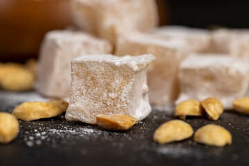 Turkish delight on the table, Turkish delight cubes and toasted peanuts