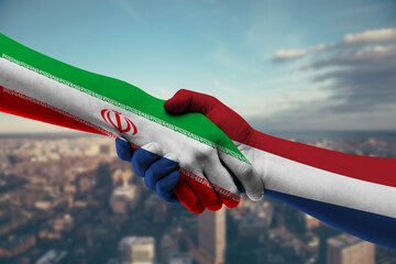 Shaking hands Iran and Netherlands