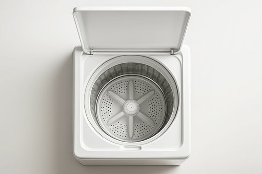 High resolution close-up photo of the empty stainless steel drum of a top-loading washing machine with open lid, showing modern appliance design, representing laundry, household cleaning, hygiene