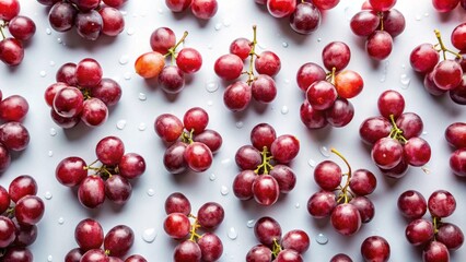 A Pattern of Fresh Red Grapes with Water Droplets on a Light Background