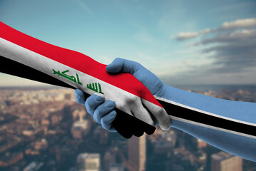 Shaking hands Iraq and Botswana