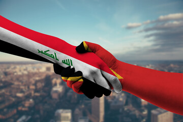 Shaking hands Iraq and East Timor