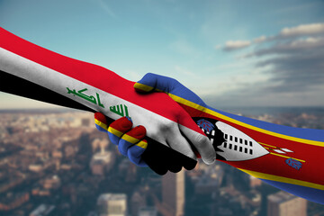 Shaking hands Iraq and Eswatini