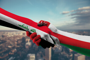 Shaking hands Iraq and Oman